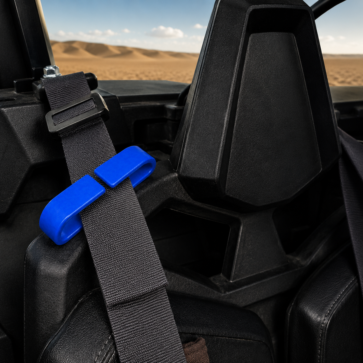 Blue RZR seat belt clip installed on Polaris RZR Pro XP seat