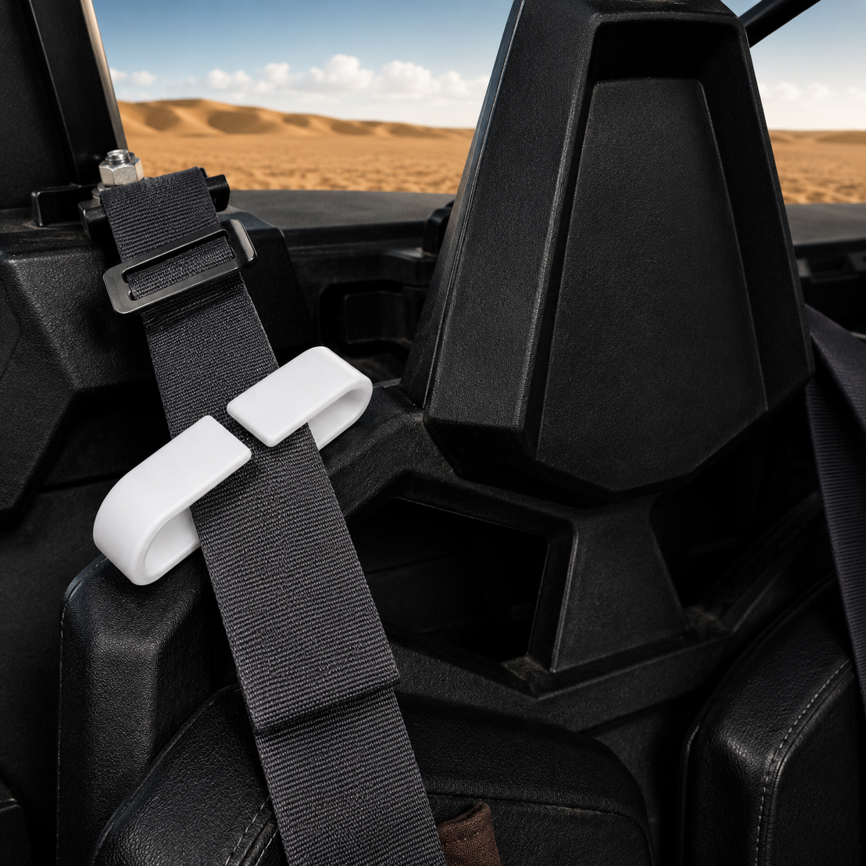 White RZR seat belt clip installed on Polaris RZR Pro XP seat